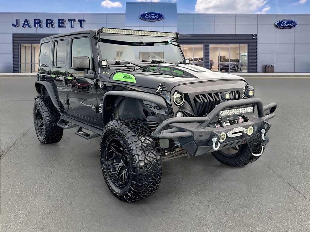Used 2017 Jeep Wrangler Unlimited Sahara w/ Connectivity Group AWD/4WD image 1