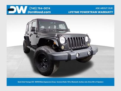 Used 2017 Jeep Wrangler Unlimited Sport w/ Mopar Black Appearance Group