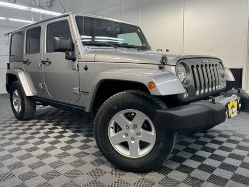 Used 2014 Jeep Wrangler Unlimited Freedom Edition image 1