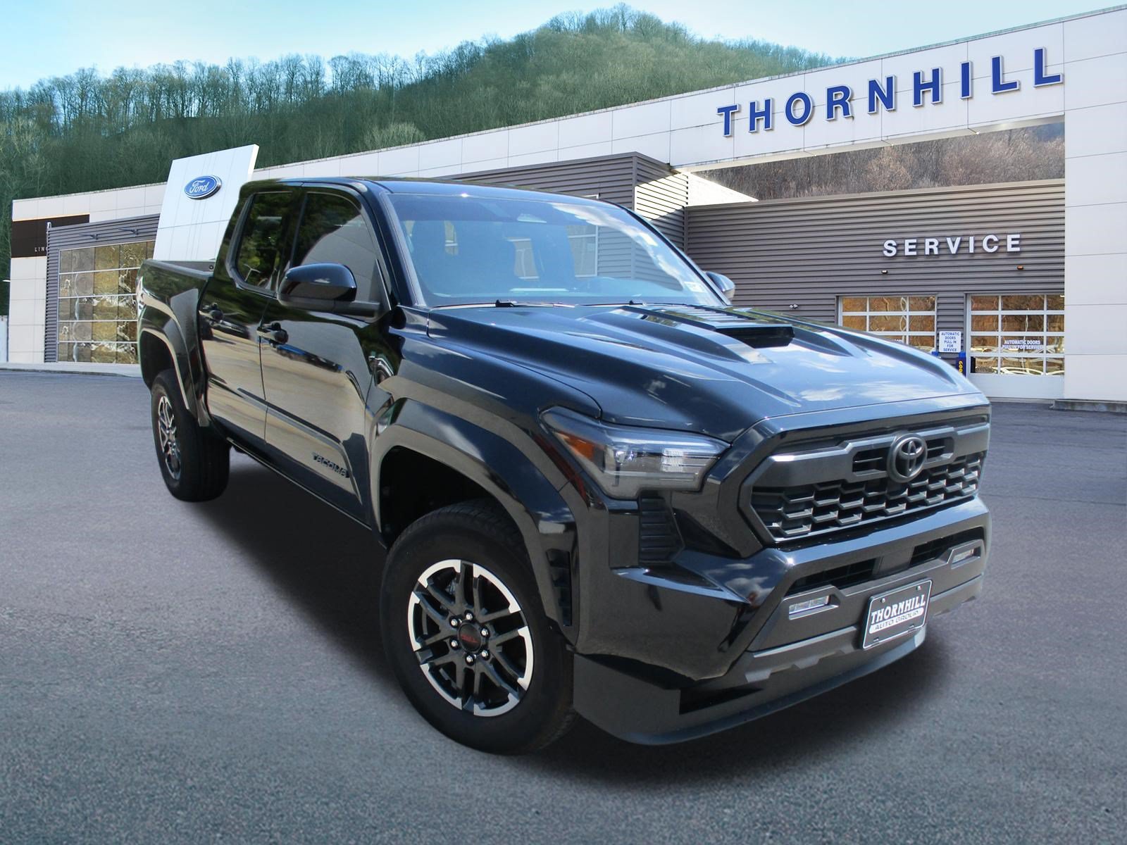 Used 2025 Toyota Tacoma TRD Sport AWD/4WD image 1