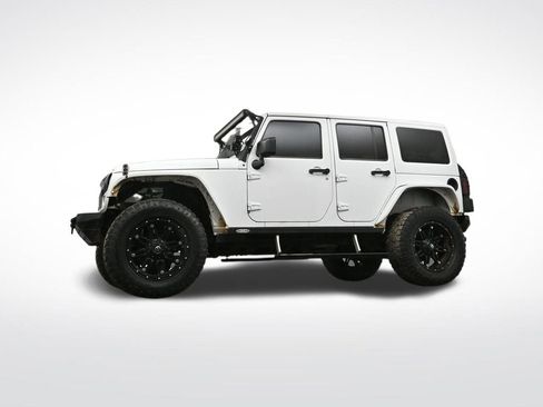 Used 2014 Jeep Wrangler Unlimited Sahara w/ Dual Top Group image 31