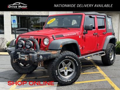 Used 2012 Jeep Wrangler Unlimited Rubicon w/ Dual Top Group
