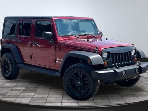 Used 2012 Jeep Wrangler Unlimited Sport AWD/4WD image 1