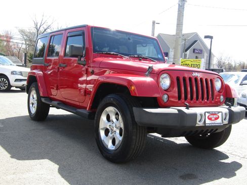 Used 2014 Jeep Wrangler Unlimited Sahara w/ Max Tow Package image 1
