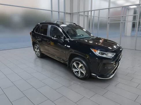 Used 2021 Toyota RAV4 SE w/ Weather & Moonroof Package AWD/4WD image 2