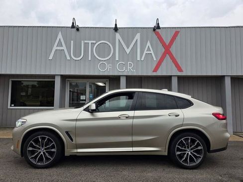 Used 2021 BMW X4 xDrive30i AWD/4WD image 1