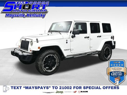 Used 2012 Jeep Wrangler Unlimited Sahara AWD/4WD image 1