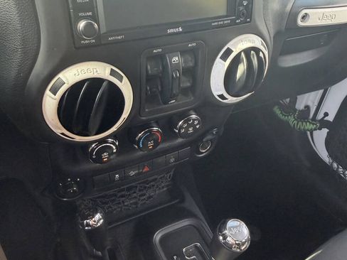Used 2014 Jeep Wrangler Unlimited Rubicon w/ Dual Top Group AWD/4WD image 11