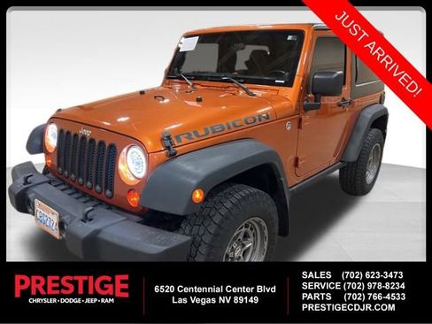 Used 2011 Jeep Wrangler Rubicon w/ Dual Top Group image 1