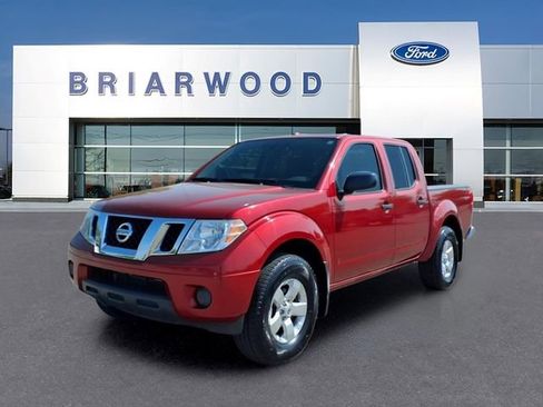 Used 2012 Nissan Frontier SV w/ SV Premium Utility Pkg AWD/4WD image 1