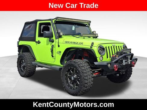Used 2012 Jeep Wrangler Sahara w/ Connectivity Group AWD/4WD image 1