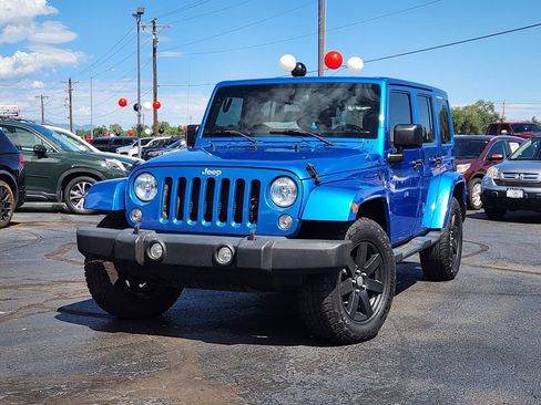 Used 2015 Jeep Wrangler Unlimited Sahara AWD/4WD image 1
