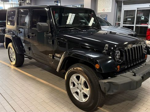 Used 2012 Jeep Wrangler Unlimited Sahara w/ Dual Top Group image 2