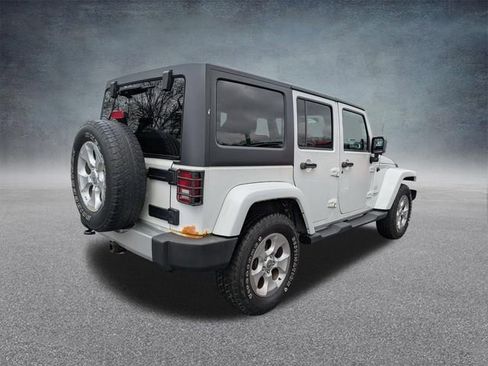 Used 2013 Jeep Wrangler Unlimited Sahara w/ Dual Top Group AWD/4WD image 3