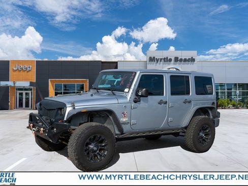 Used 2013 Jeep Wrangler Unlimited Sahara w/ Dual Top Group image 1