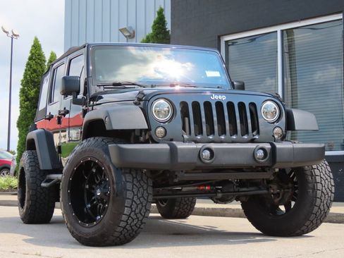Used 2014 Jeep Wrangler Unlimited Sport AWD/4WD image 1