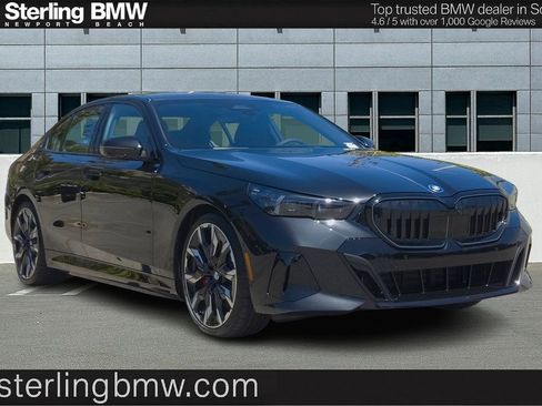 New 2026 BMW 550e xDrive w/ Premium Package AWD/4WD image 1