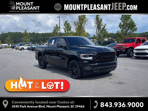 Used 2023 RAM 1500 Laramie AWD/4WD image 1