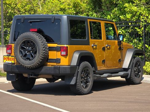 Used 2014 Jeep Wrangler Unlimited Rubicon w/ Dual Top Group AWD/4WD image 4