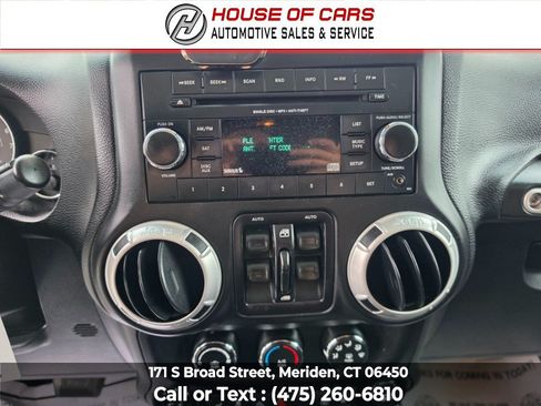 Used 2016 Jeep Wrangler Unlimited Sahara w/ Dual Top Group AWD/4WD image 24