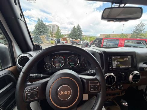 Used 2013 Jeep Wrangler Unlimited Sahara w/ Dual Top Group AWD/4WD image 18