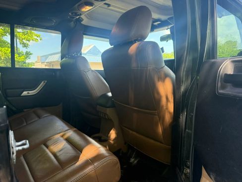 Used 2012 Jeep Wrangler Unlimited Sahara w/ Dual Top Group AWD/4WD image 14