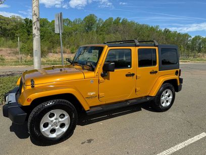 Used 2014 Jeep Wrangler Unlimited Sahara w/ Dual Top Group