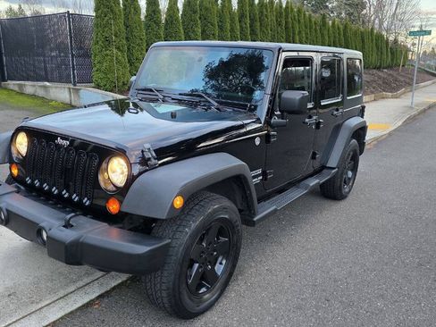 Used 2011 Jeep Wrangler Unlimited Sport AWD/4WD image 1
