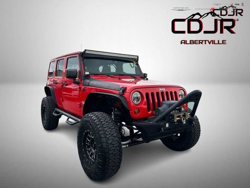 Used 2015 Jeep Wrangler Unlimited Sahara AWD/4WD image 1