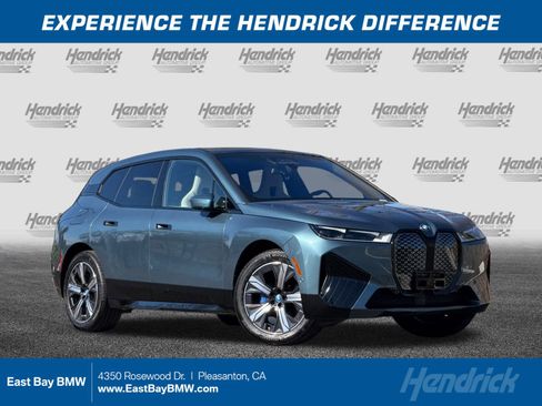 Used 2025 BMW iX xDrive50 w/ Premium Package image 1