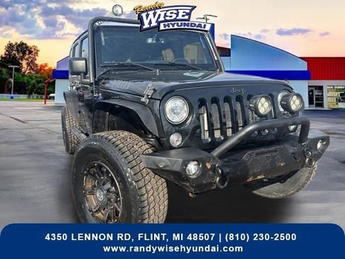 Used 2017 Jeep Wrangler Unlimited Sport image 1