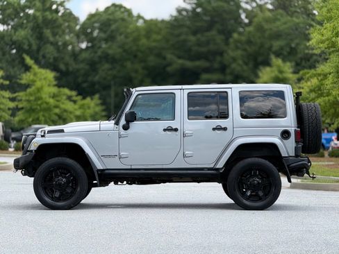 Used 2014 Jeep Wrangler Unlimited Rubicon w/ Dual Top Group AWD/4WD image 9