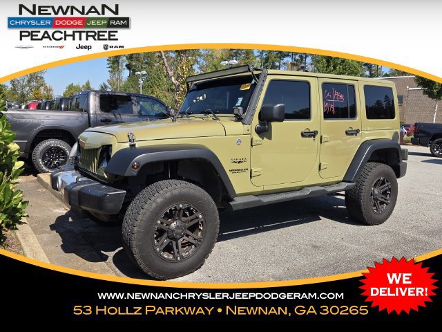 Used 2013 Jeep Wrangler Unlimited Sahara w/ Connectivity Group AWD/4WD image 1