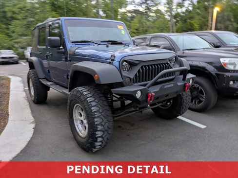 Used 2010 Jeep Wrangler Unlimited Sport image 1