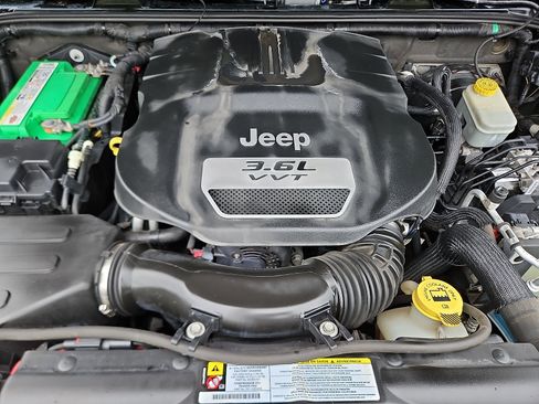 Used 2012 Jeep Wrangler Sport w/ Mopar Chrome Edition Group AWD/4WD image 24