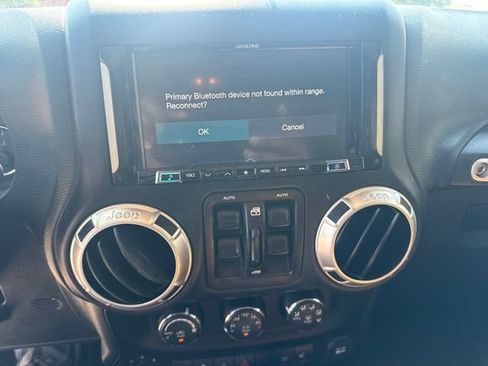 Used 2016 Jeep Wrangler Unlimited Sahara w/ Dual Top Group AWD/4WD image 11