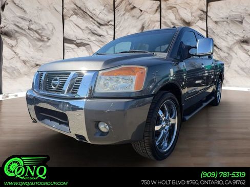 Used 2011 Nissan Titan SL w/ SL Max Utility Pkg image 1