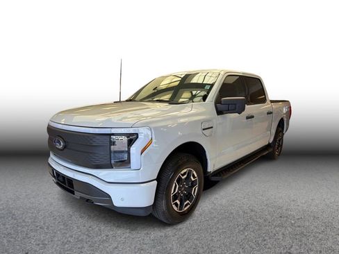 Used 2023 Ford F150 Lightning XLT AWD/4WD image 1
