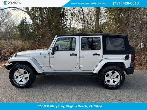 Used 2012 Jeep Wrangler Unlimited Sahara w/ Dual Top Group image 1
