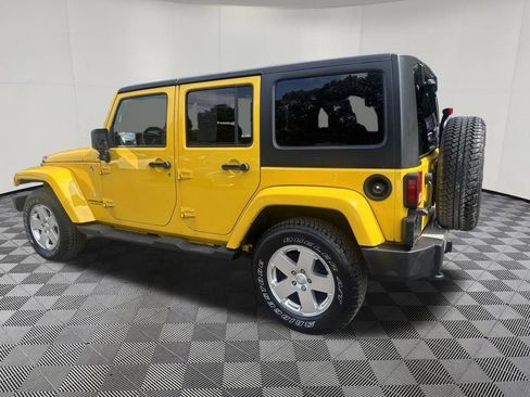 Used 2011 Jeep Wrangler Unlimited Sahara w/ Dual Top Group AWD/4WD image 16