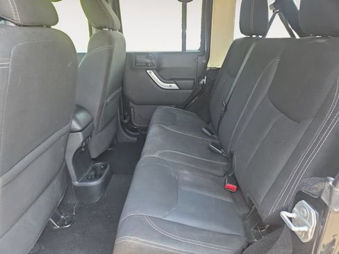 Used 2016 Jeep Wrangler Unlimited Sahara w/ Dual Top Group AWD/4WD image 14