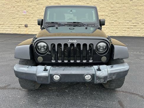 Used 2014 Jeep Wrangler Unlimited Sahara w/ Dual Top Group AWD/4WD image 8