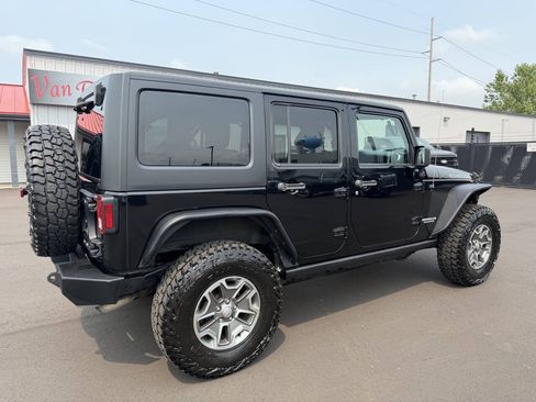 Used 2013 Jeep Wrangler Unlimited Rubicon w/ Dual Top Group AWD/4WD image 8