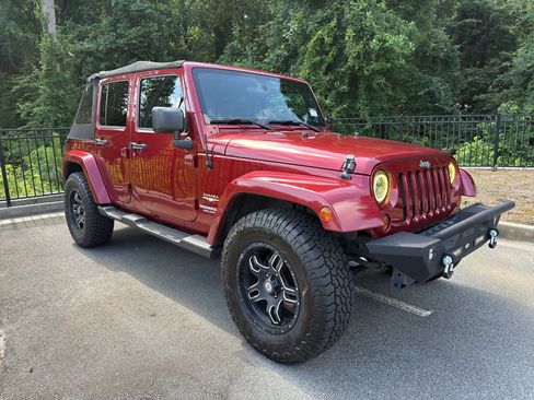 Used 2012 Jeep Wrangler Unlimited Sahara w/ Dual Top Group AWD/4WD image 4