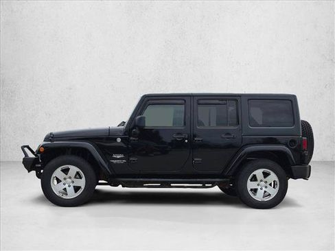 Used 2011 Jeep Wrangler Unlimited Sahara w/ Dual Top Group AWD/4WD image 9