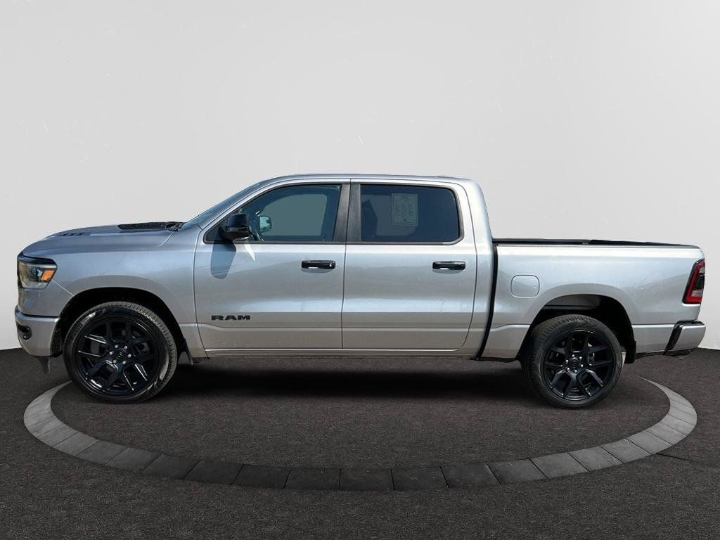 Used 2024 RAM 1500 Laramie AWD/4WD image 1