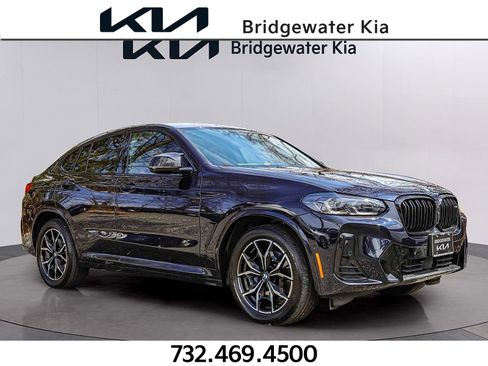 Used 2023 BMW X4 M40i AWD/4WD image 1