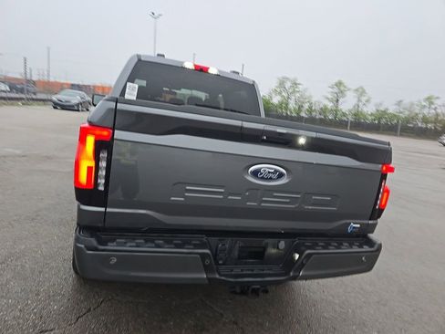 Used 2023 Ford F150 Lightning XLT w/ Equipment Group 312A High image 5