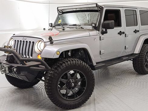 Used 2014 Jeep Wrangler Unlimited Rubicon w/ Dual Top Group AWD/4WD image 6