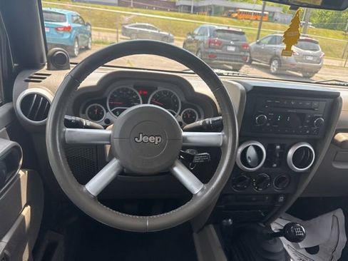 Used 2010 Jeep Wrangler Unlimited Sahara w/ Dual Top Group AWD/4WD image 11